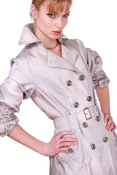 Portret van de mooie jonge vrouw in grijze kleding — Stockfoto