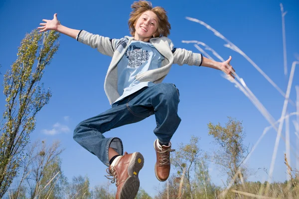Feliz Chico Saltando —  Fotos de Stock