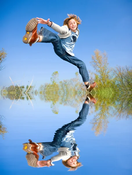 Happy jumping boy — Stock Photo, Image