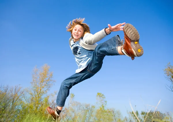 Feliz Chico Saltando —  Fotos de Stock