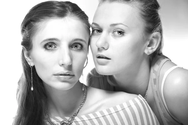 Two beautiful young woman. Soft focus. In studio. — Stock Photo, Image
