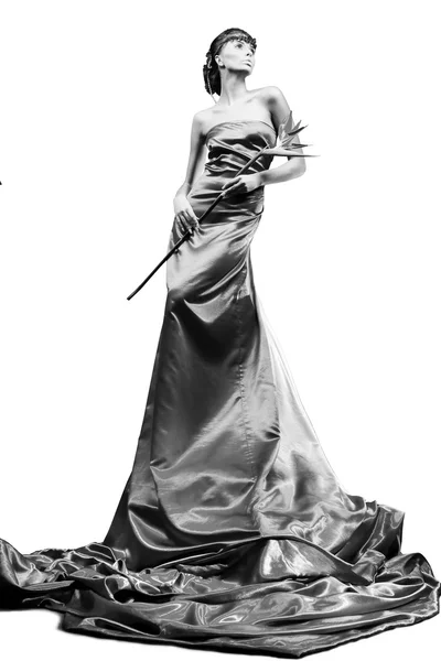 Красивая Девушка Длинном Красном Платье Держит Экзотический Цветок Руке Белом — стоковое фото