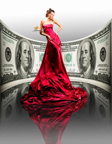 Menina bonita em vestido vermelho, dinheiro. 100 dólares americanos — Fotografia de Stock