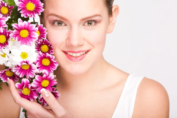 Portrait Beautiful girl with flower. Focus on eyes — Stock Photo, Image