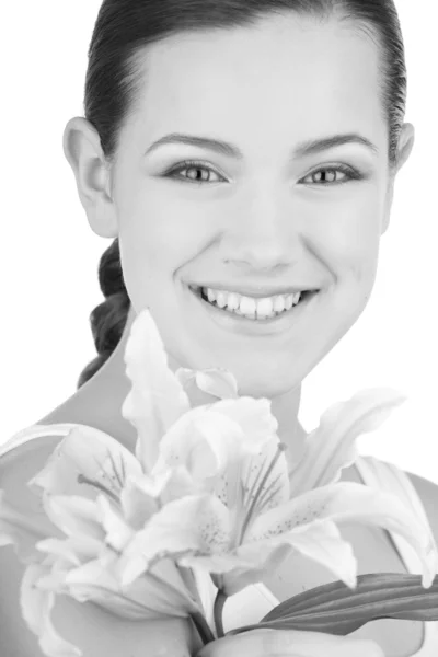 Porträtt vacker flicka med blomma. mjukt fokus. fokusera på ögonen — Stockfoto