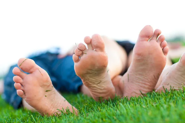 stock image Bare feet on grass