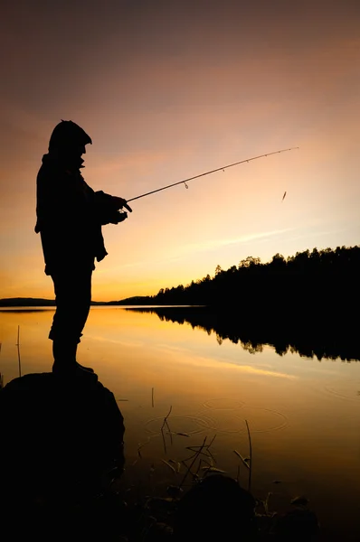 Rybář silueta — Stock fotografie