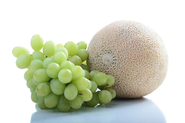 Melon and grapes — Stock Photo, Image
