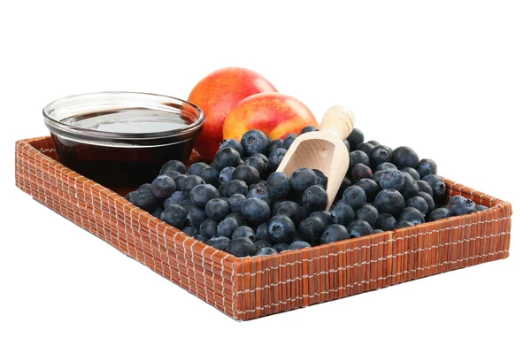 Persika, honung och blåbär — Stockfoto
