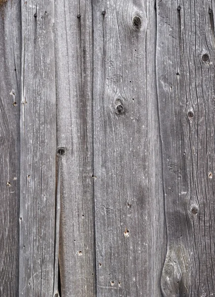 Verweerde grijze houten planken achtergrond — Stockfoto