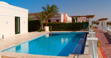 Swimming pool near the house in el-gouna, egypt clipart