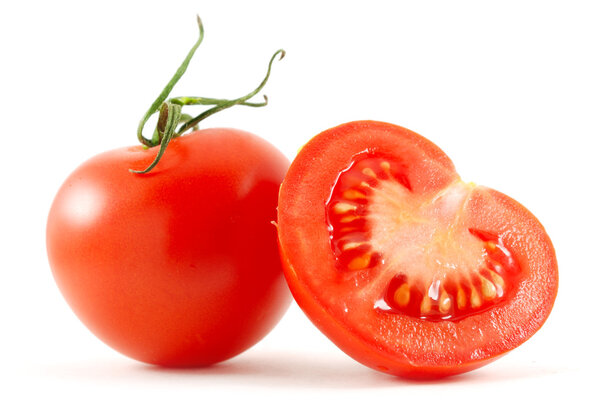 Two tomatoes isolated on white