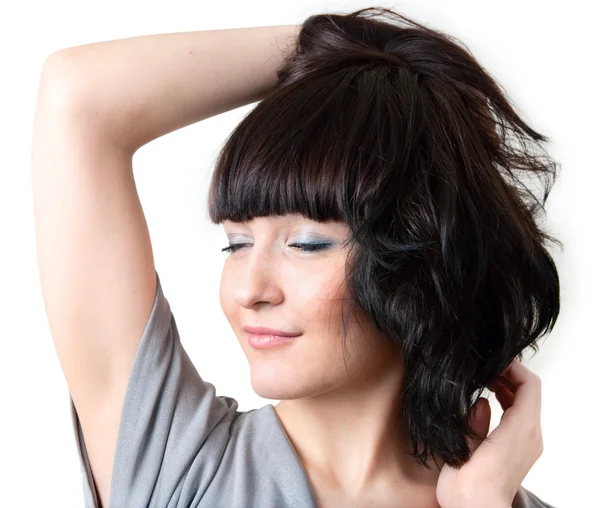Beautiful woman shakes her hair, isolated on wh — Stock Photo, Image