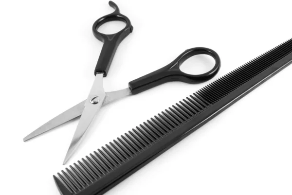 Scissors and comb isolated on white — Stock Photo, Image
