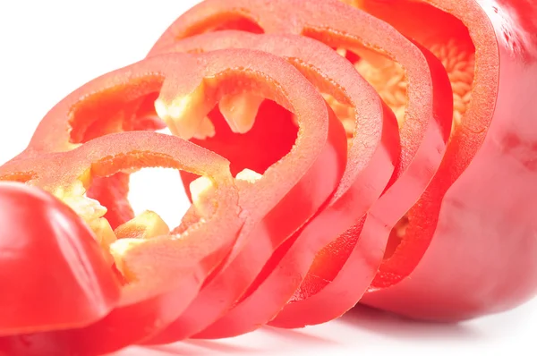 Close-up van gesneden rode paprika — Stockfoto