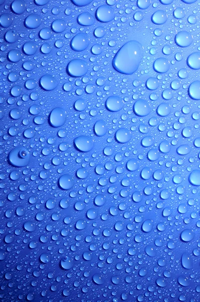 Niebieska woda krople na szkło — Zdjęcie stockowe
