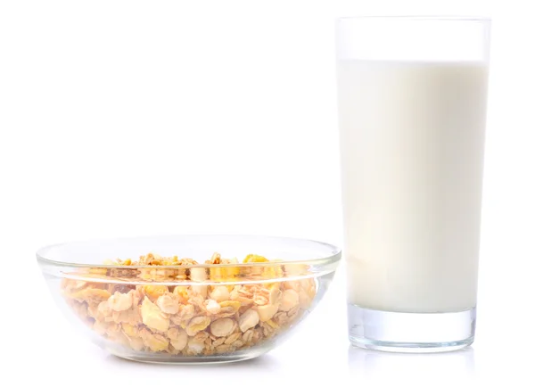 Muesli con latte isolato su bianco — Foto Stock