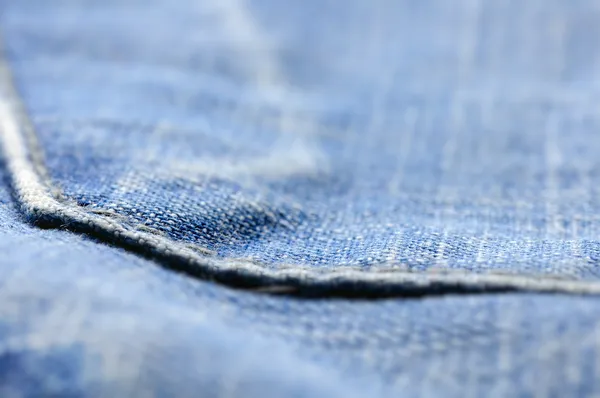 Closeup of blue jeans pocket, shallow dof — Stock Photo, Image