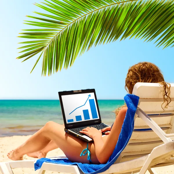 Sexy woman works near the sea — Stock Photo, Image