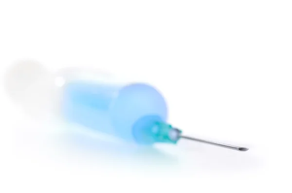 Syringe with blue liquid isolated on white — Stock Photo, Image