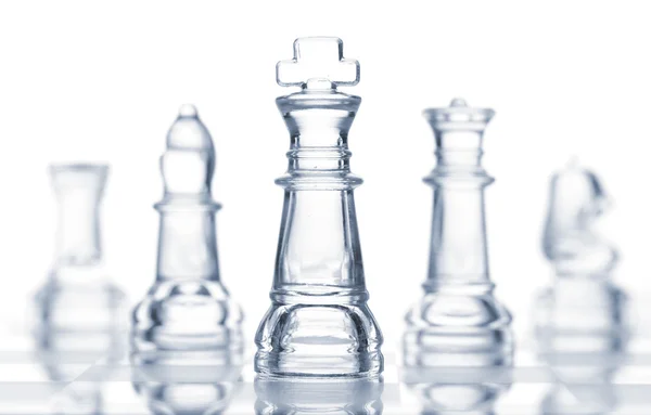 白色孤立的透明玻璃国际象棋 — 图库照片