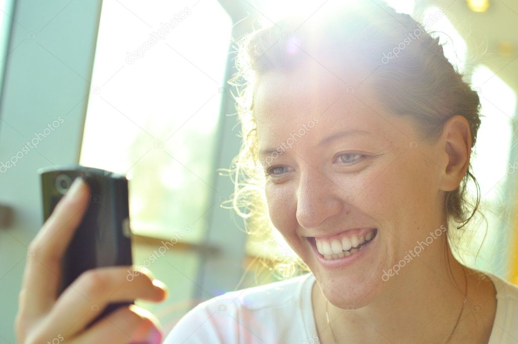Woman is watching at phone