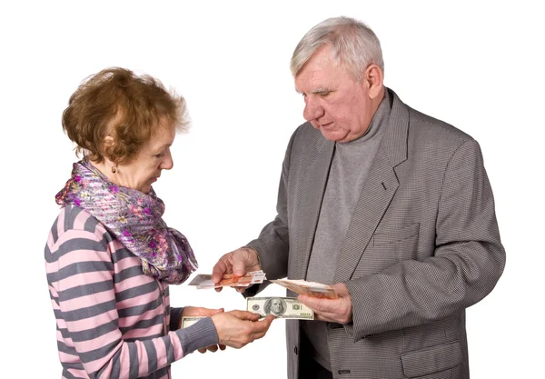 Older persons with money in hands — Stock Photo, Image