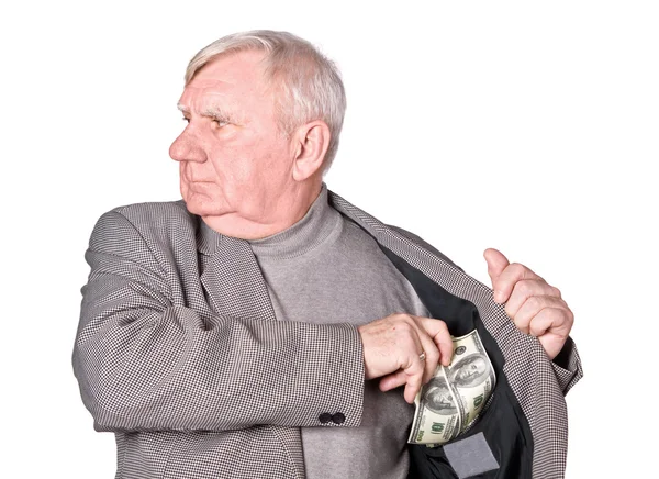 Elderly man puts money in an internal pocket of a jacket — Stock Photo, Image