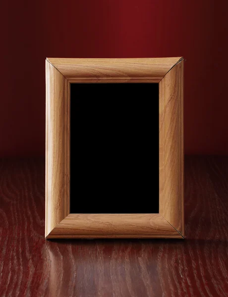 Photo-frame on table — Stock Photo, Image