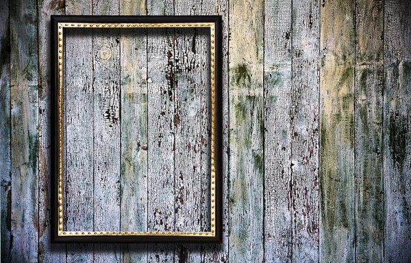 Рамка на деревянном фоне — стоковое фото