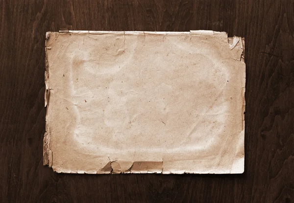 Gamla papper på trä textur — Stockfoto