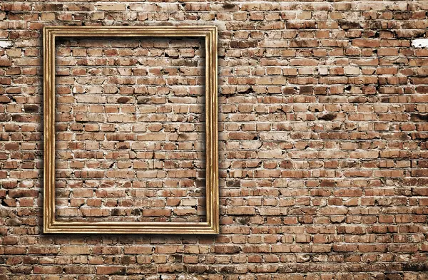 Photo frame on brick wall — Stock Photo, Image