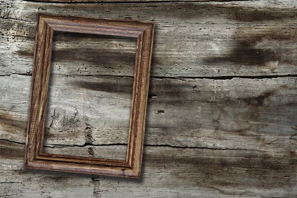 Frame on wooden background — Stock Photo, Image