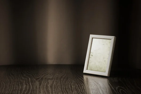 stock image Photo-frame on table