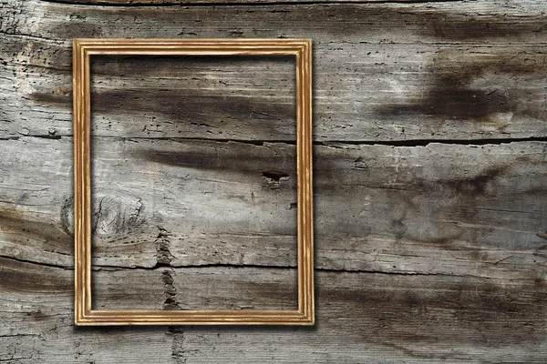 Рамка на деревянном фоне — стоковое фото
