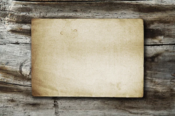 Vintage paper on wood texture — Stock Photo, Image