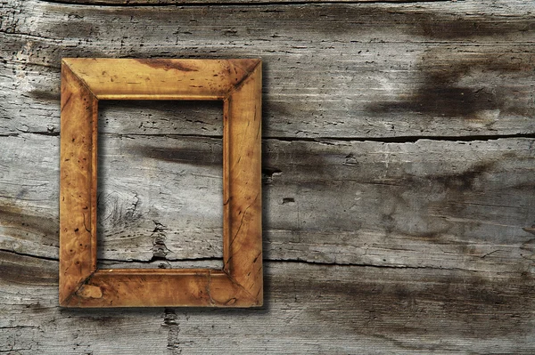 Frame on wooden background