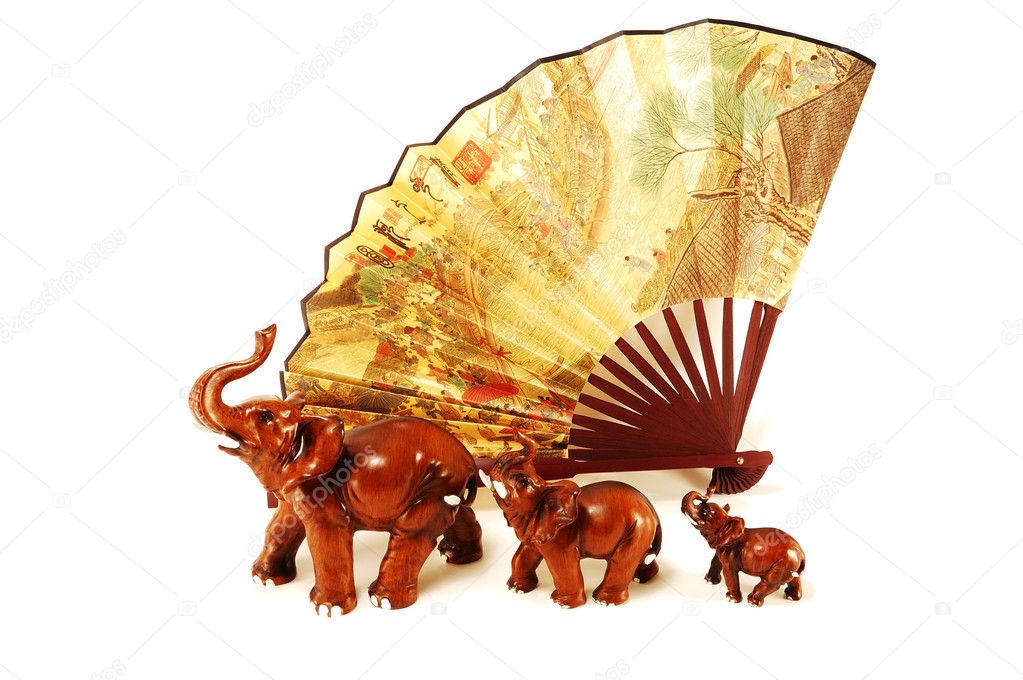 Three elephants and a fan