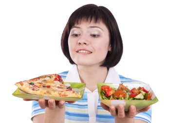 Woman makes choice of pizza and salad clipart