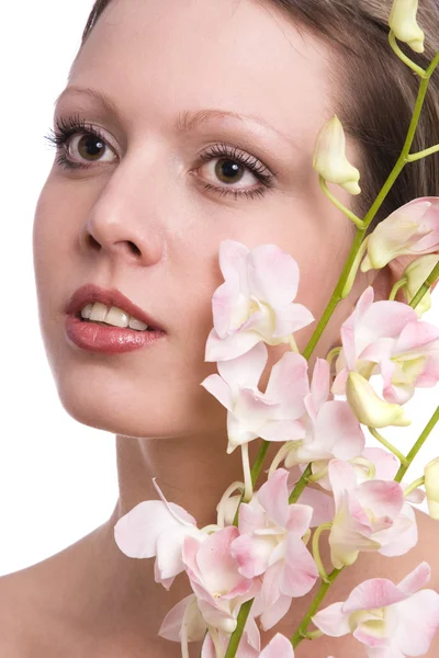 Retrato de mujer bastante joven con orquídea —  Fotos de Stock
