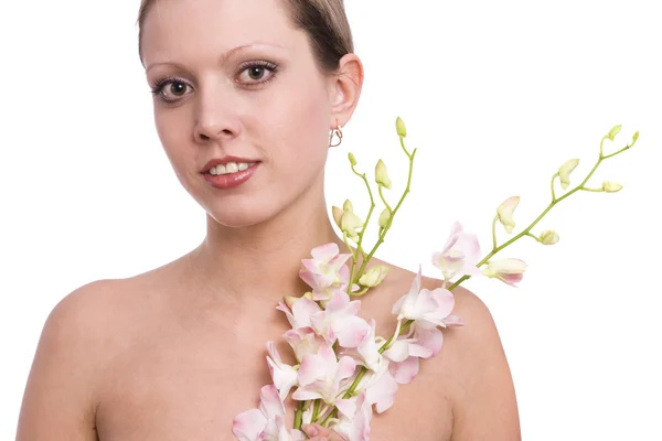Bella giovane donna ritratto con orchidea — Foto Stock