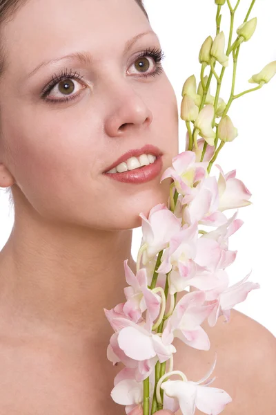 Retrato de mulher muito jovem com orquídea — Fotografia de Stock