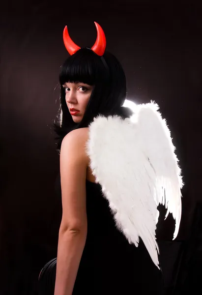 Vrouw is een engel en duivel — Stockfoto