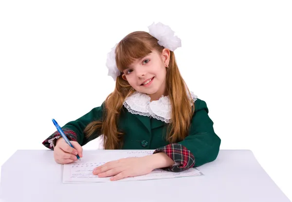 Schoolmeisje haar huiswerk. — Stockfoto