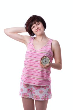 Sleepy woman holding alarm clock clipart