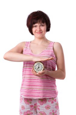 Sleepy woman is holding alarm clock clipart