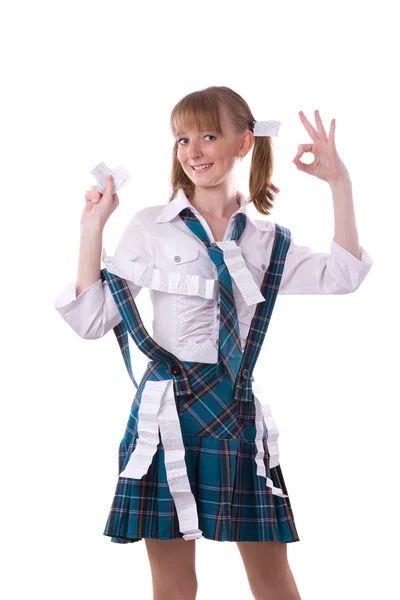 Menina do ensino médio está escondendo lençol de berço em uniforme . — Fotografia de Stock