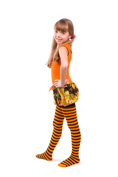 Little girl wearing orange dress — Stok fotoğraf