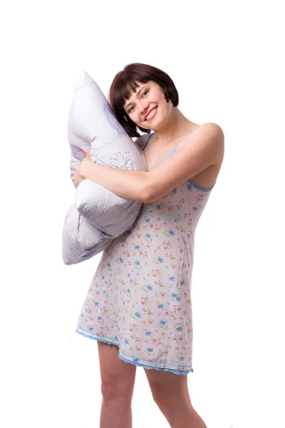 Счастливая девочка с подушкой — стоковое фото