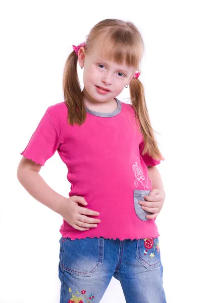 Mały dziewczyna pozuje w przedniej części aparatu — Zdjęcie stockowe